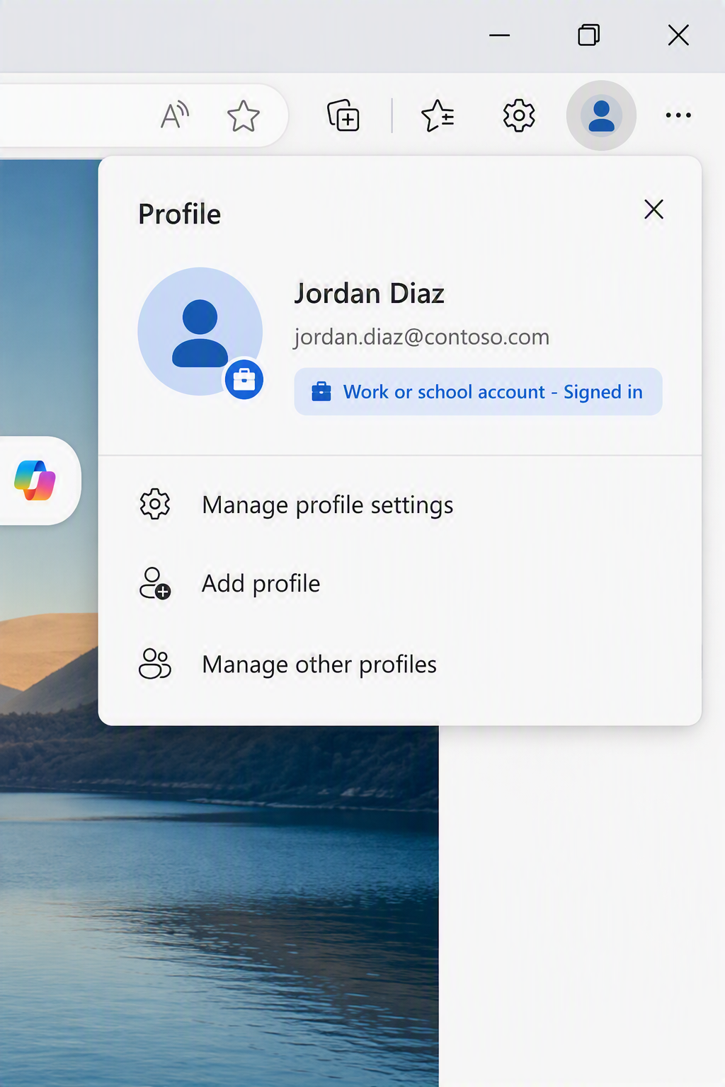Microsoft Edge profile menu showing a work account signed in with options to manage profile settings or add a profile